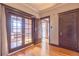 The living room features hardwood floors and vintage doors for plenty of natural light at 1475 N Humboldt St # 22, Denver, CO 80218