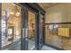 Classic lobby with glass-paned doors and vintage chandelier and mailboxes, showing vintage elegance at 1475 N Humboldt St # 22, Denver, CO 80218