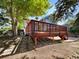 Enjoy outdoor living on this spacious deck, shaded by mature trees at 5005 W 128Th Pl, Broomfield, CO 80020