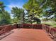 A backyard deck is surrounded by mature trees at 5005 W 128Th Pl, Broomfield, CO 80020