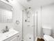 Bright bathroom features a walk-in shower, modern sink, and sleek fixtures at 5005 W 128Th Pl, Broomfield, CO 80020