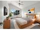 Brightly lit main bedroom with vaulted ceiling and large windows offering a beautiful view at 5005 W 128Th Pl, Broomfield, CO 80020