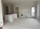 Spacious room with rough walls and a back door overlooking a beautiful view at 15267 Fillmore St, Thornton, CO 80602