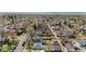 Panoramic aerial view displaying neighborhood, with a view of houses, tree-lined streets, and the surrounding community at 4563 W 34Th Ave, Denver, CO 80212