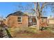 Charming brick home with a well-maintained yard and mature tree at 4563 W 34Th Ave, Denver, CO 80212
