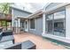 Exterior wooden back patio featuring neutral outdoor furniture at 7925 York St # 2, Denver, CO 80229