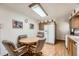 Cozy eat in kitchen with four chairs and lots of cabinet space at 678 S Oswego Ct, Aurora, CO 80012