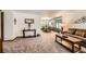 Open concept living space featuring a dining area with decor and lots of natural light at 678 S Oswego Ct, Aurora, CO 80012