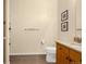 Bathroom with tile flooring, granite countertop, and wall decor at 9390 W Chatfield Pl # 104, Littleton, CO 80128