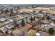 Neighborhood aerial view highlighting the home's location near schools, parks, and community amenities at 3344 S Uinta Ct, Denver, CO 80231