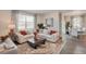 Inviting living room filled with natural light and a comfortable seating area at 1885 Mount Monroe Dr, Berthoud, CO 80513