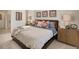 Comfortable main bedroom with soft carpeting, stylish decor, and cozy linens at 1885 Mount Monroe Dr, Berthoud, CO 80513