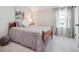Cozy bedroom with soft lighting, plush bedding, and a peaceful ambiance at 6953 S Prescott St, Littleton, CO 80120
