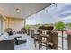 Spacious balcony with cozy seating, perfect for enjoying outdoor dining and relaxation with city views at 800 N Washington St # 508, Denver, CO 80203