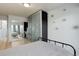 Bright bedroom with stylish decor, mirrored closets, and a glimpse of the balcony, creating a serene retreat at 800 N Washington St # 508, Denver, CO 80203