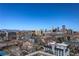Stunning city views of downtown Denver featuring modern buildings and Rocky Mountains in the background at 800 N Washington St # 508, Denver, CO 80203