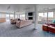 Spacious common room featuring city views, fireplace, and comfortable furniture at 800 N Washington St # 508, Denver, CO 80203