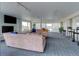 Inviting common room with fireplace, comfortable seating, and floor-to-ceiling windows at 800 N Washington St # 508, Denver, CO 80203
