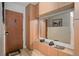 Practical entryway with built-in storage and large mirror, perfect for gear at 800 N Washington St # 508, Denver, CO 80203