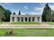 Picturesque park with manicured lawn, towering trees, and classic architecture at 800 N Washington St # 508, Denver, CO 80203