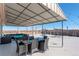 Spacious rooftop deck with patio furniture and panoramic city views at 800 N Washington St # 508, Denver, CO 80203