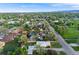 Residential area with tree-lined streets, well-maintained homes, and lush greenery, offering a serene and inviting neighborhood feel at 310 Jay St, Lakewood, CO 80226