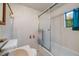 Bathroom with shower-tub combination and vintage fixtures at 310 Jay St, Lakewood, CO 80226