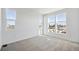 This bright bedroom has large windows letting in plenty of natural light at 1222 Penner Dr, Erie, CO 80026