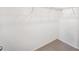 Walk-in closet with wire shelving and carpet at 1222 Penner Dr, Erie, CO 80026