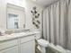 Contemporary bathroom featuring a shower and vanity at 19197 E 64Th Ave, Denver, CO 80249