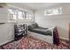 Bright bedroom with built-in bed frame, natural light, and red patterned rug at 780 Campo St, Denver, CO 80221