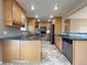 Stylish kitchen featuring granite countertops, stainless steel appliances, and ample cabinet space at 2357 E Mineral Ave, Centennial, CO 80122