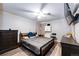 Cozy bedroom featuring a ceiling fan and neutral walls at 3111 Troy St, Aurora, CO 80011