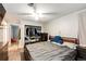 Bedroom with closet, wood floors, and ample natural light at 3111 Troy St, Aurora, CO 80011