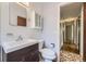 Bathroom features a vanity and toilet at 1750 S Dale Ct, Denver, CO 80219