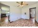 Open dining room area with unique tile flooring and natural light at 1750 S Dale Ct, Denver, CO 80219