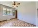Bright dining room with unique tile flooring and a ceiling fan at 1750 S Dale Ct, Denver, CO 80219