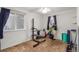 Home gym with workout equipment, including a weight bench, and stationary bike at 6193 Brantly Ave, Castle Rock, CO 80104