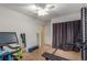 Home gym featuring fitness equipment and mirrors at 6193 Brantly Ave, Castle Rock, CO 80104