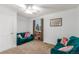 Inviting living room with plush green sofas, accent pillows, and natural light at 6193 Brantly Ave, Castle Rock, CO 80104