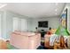 Comfortable living room with plush sofas, entertainment center, and stylish decor at 300 W 11Th Ave # 15F, Denver, CO 80204