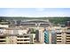 Expansive view overlooking the stadium and surrounding cityscape from a modern apartment building at 300 W 11Th Ave # 15F, Denver, CO 80204