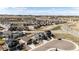 Aerial view of the community showcasing the neighborhood's layout and proximity to open land at 929 Honey Berry Ct, Elizabeth, CO 80107