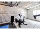 Unfinished basement with gym equipment; ready for fitness enthusiasts to customize at 929 Honey Berry Ct, Elizabeth, CO 80107