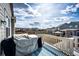 Deck with BBQ and views of fenced backyard at 929 Honey Berry Ct, Elizabeth, CO 80107