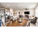 Open concept living space featuring a large island and comfortable seating area at 929 Honey Berry Ct, Elizabeth, CO 80107