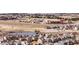 Scenic neighborhood view with a pond and retail nearby at 929 Honey Berry Ct, Elizabeth, CO 80107