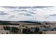 Scenic view from the property showcasing a peaceful neighborhood with rolling hills at 929 Honey Berry Ct, Elizabeth, CO 80107
