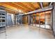 Spacious unfinished basement with exposed ceiling and duct work, plus a staircase at 1205 W 11Th Ct, Broomfield, CO 80020