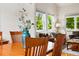 Dining room with view to the living room and large picture window at 1205 W 11Th Ct, Broomfield, CO 80020
